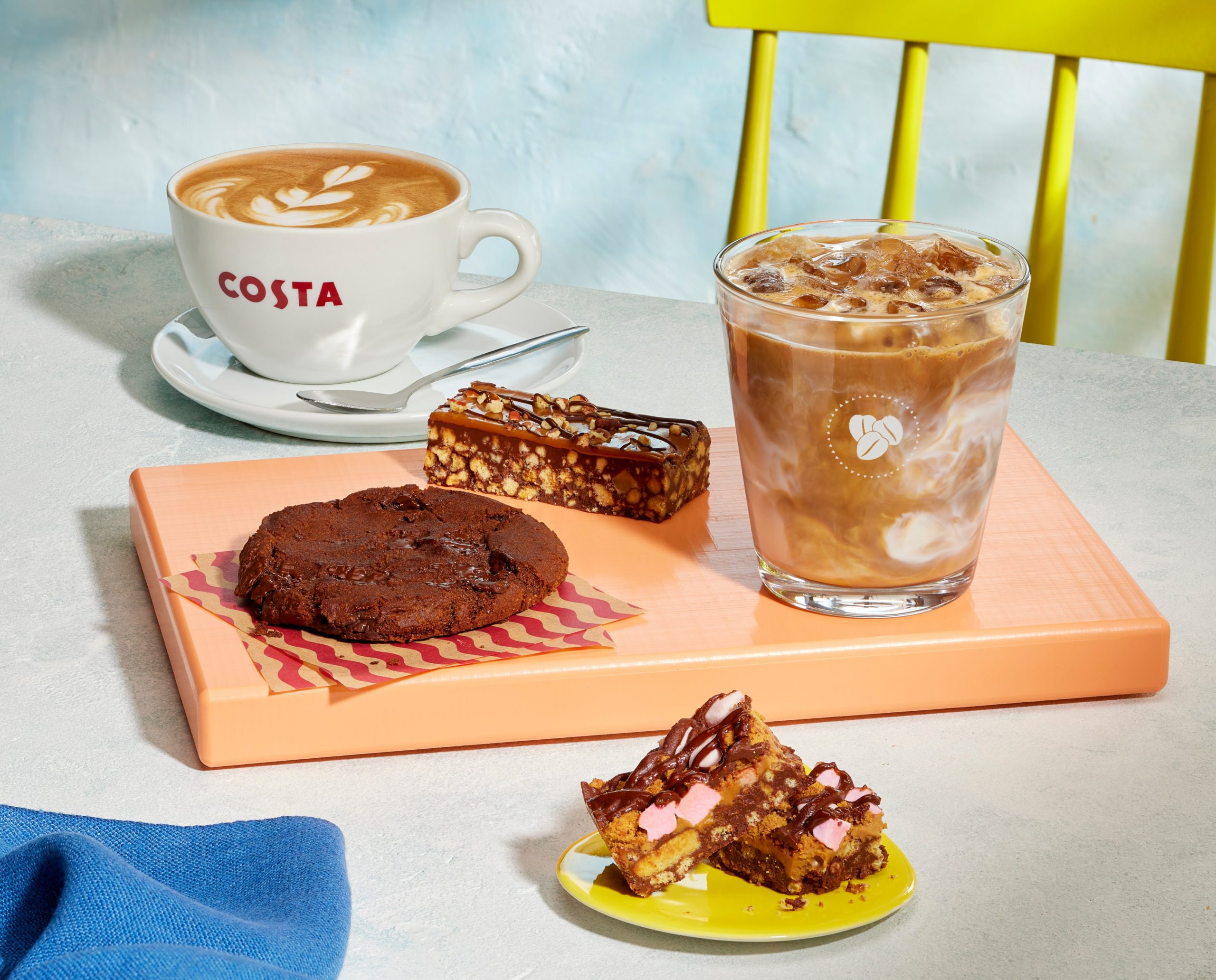 Costa Coffee Brings Joy To January With New Tasty Food And Drink Menu   Caramelised Biscuit Rocky Road  Double Chocolate Cookie Chocolate And Pecan Slice Oat Flat White Ultimate Blend Caramel Iced Lat 65953e1fe0dc7 Scaled 